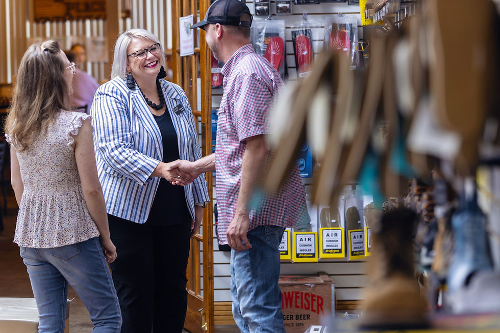 CFSB employee shaking customers hands
