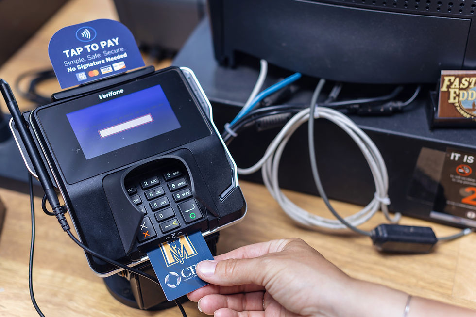 Person using their debit card