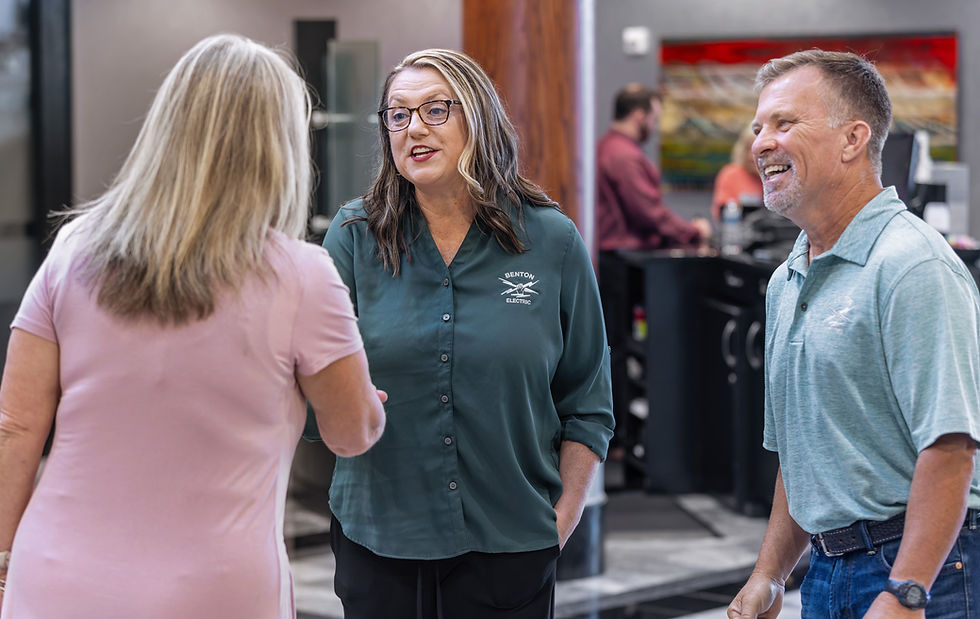 CFSB employee shaking customers hands